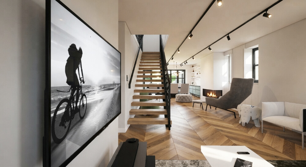Remodelação de moradia no Bairro do Restelo em Lisboa. Sala de estar e escadas metálicas e degraus flutuantes.